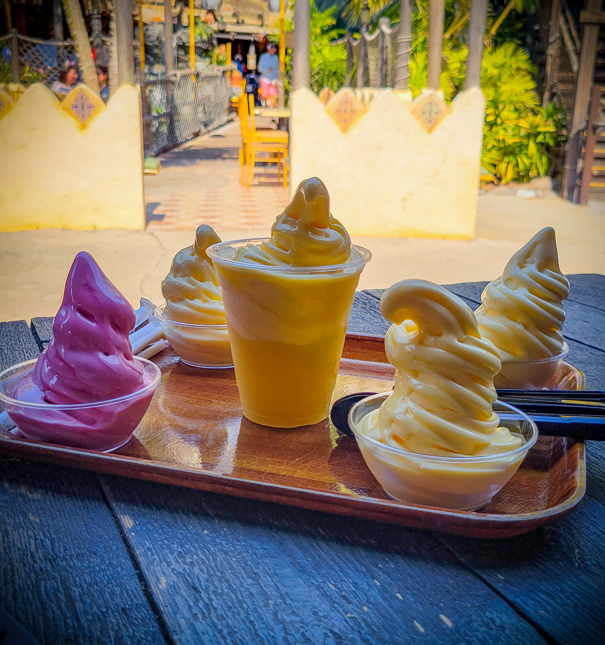 A tray full of Dole Whip options at The Tropical Hideaway in Disneyland.