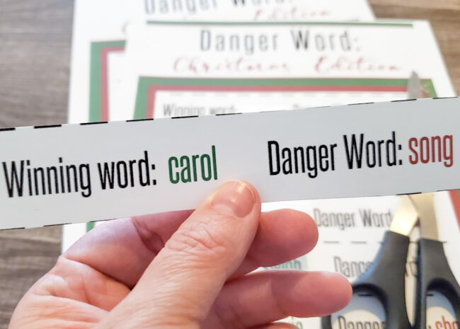 Example of Winning word and Danger word slip. Winning word say Carol, Danger word says song.