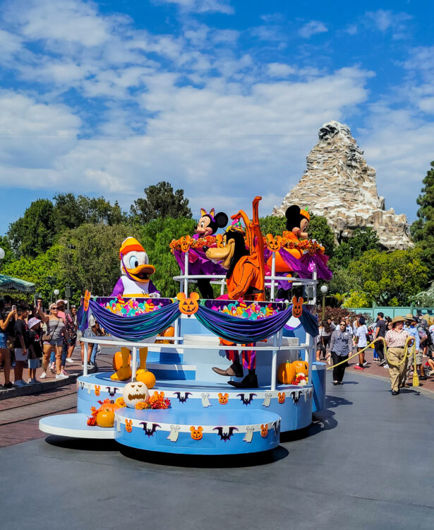 Donald, Goofy, Mickey and Minnie in Halloween Costumes on a Parade Float at Disneyland.