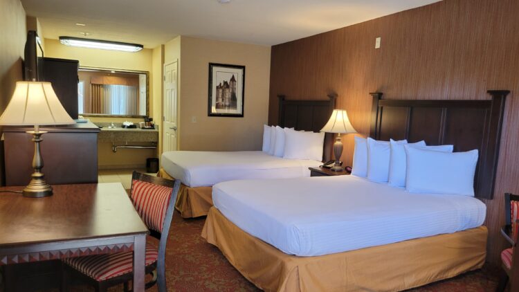 Picture of a room at Castle Inn and suites with 2 queen beds. Hotel on harbor blvd across the street from Disneyland.